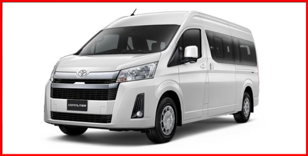 รถตู้ Toyota Commuter สีขาว มุมเฉียงด้านหน้าและด้านข้าง สำหรับบริการรถตู้พร้อมคนขับ